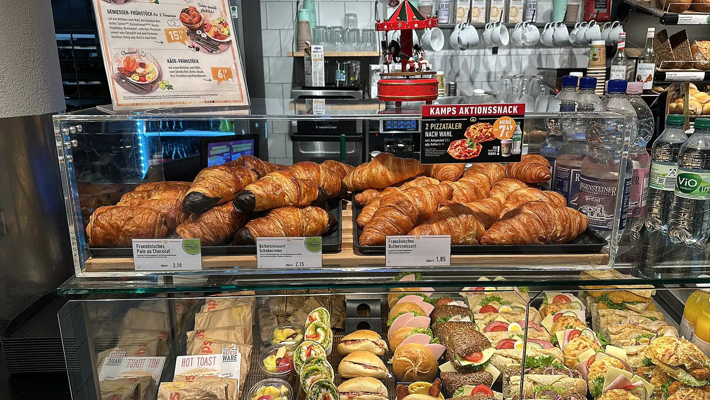 Croissants and pastries in a bakery display