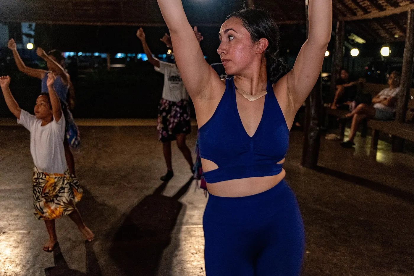 A dancer mid-routine in an evening class