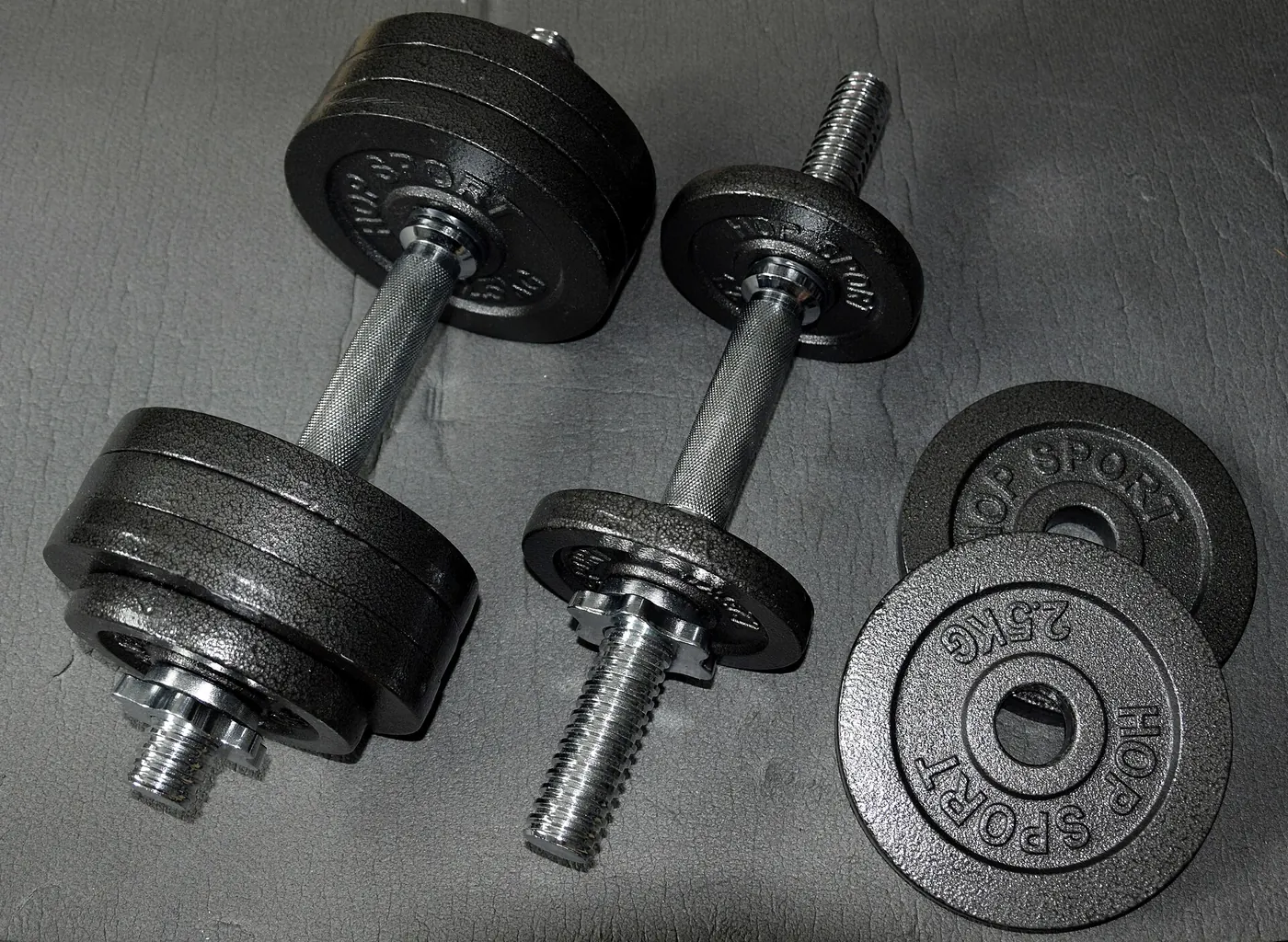Dumbbells and weight plates on the floor