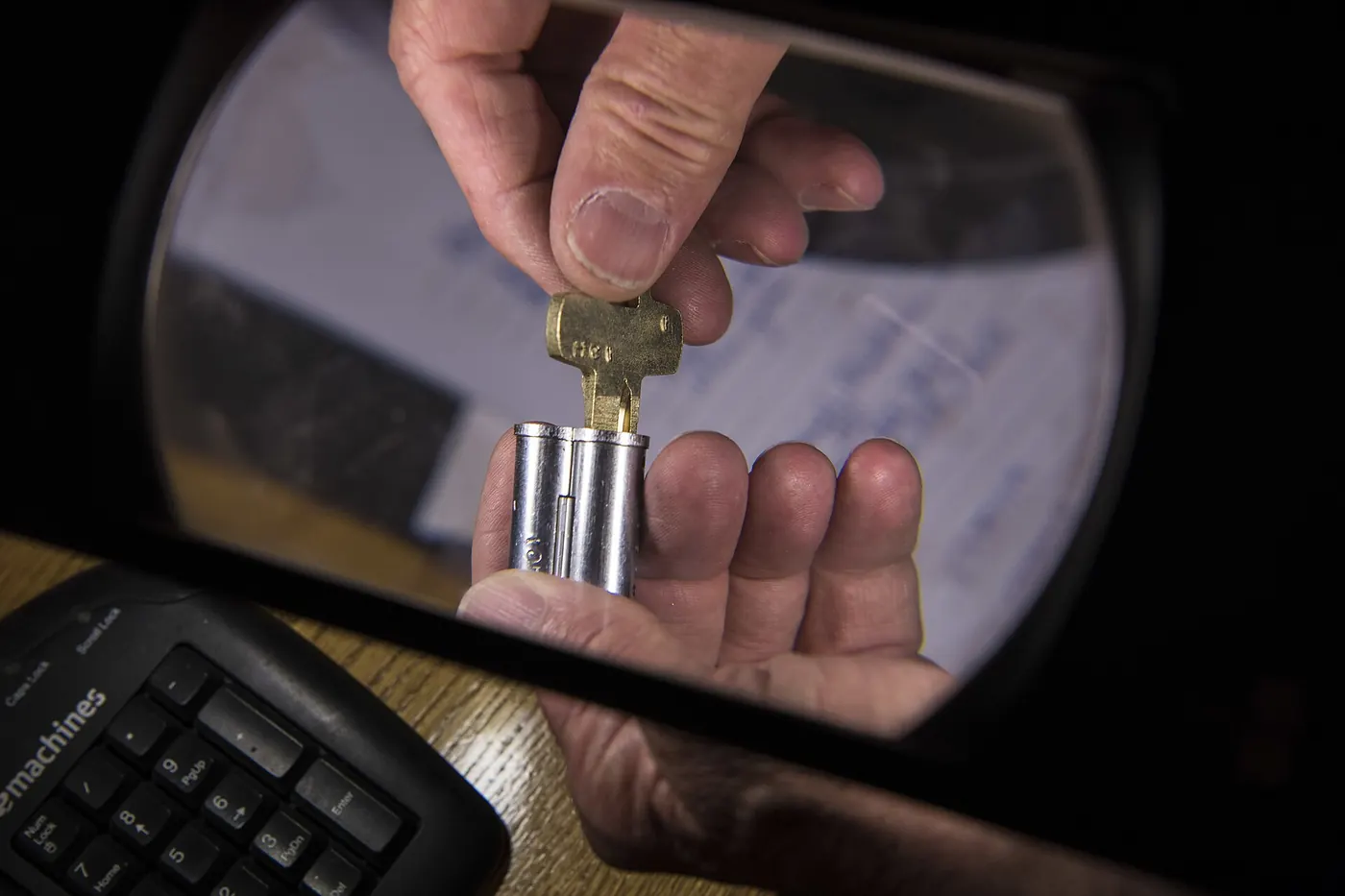 A key being turned in a lock