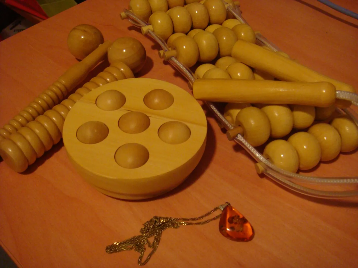 Wooden massage tools laid out on a table