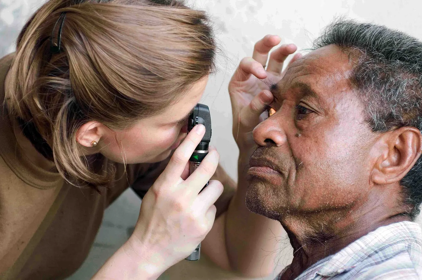 An eye examination with an ophthalmoscope
