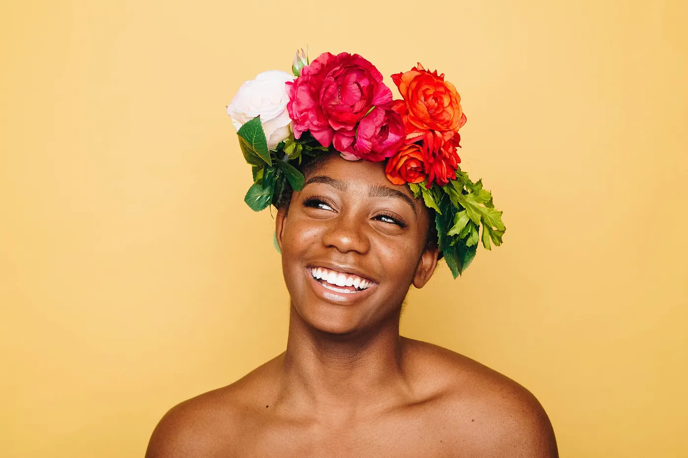 A woman with a wide, bright smile
